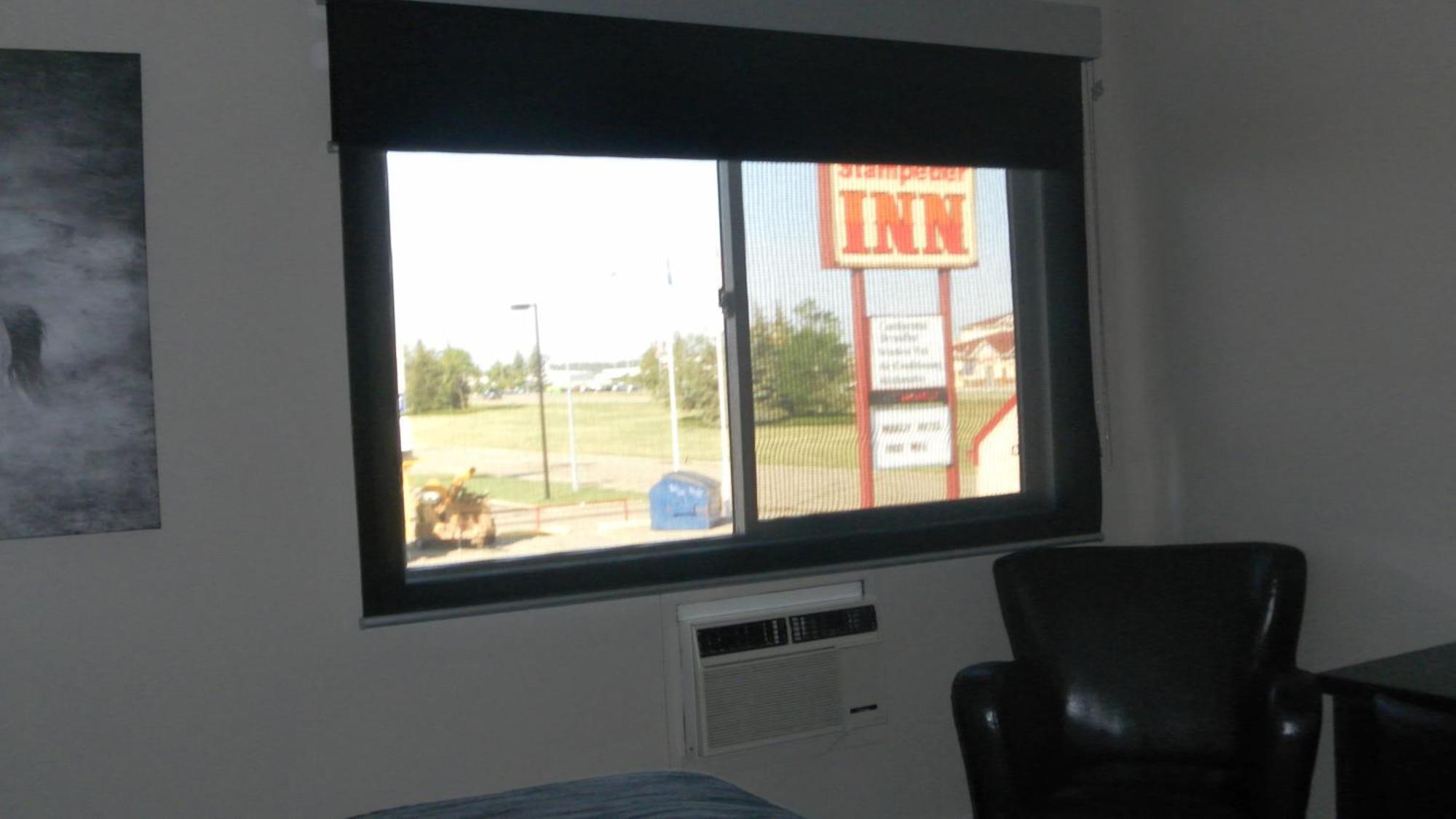 Stampeder Inn Ponoka Номер фото